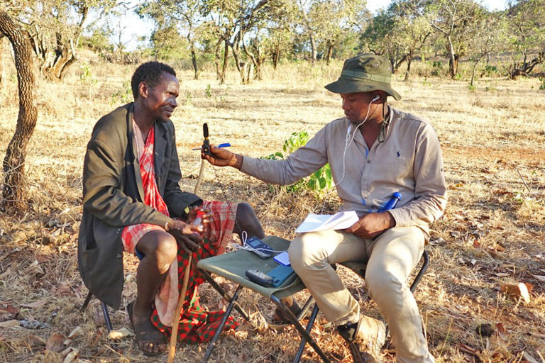 Eliupendo Laltaika interviewing a member of the Sonjo community.