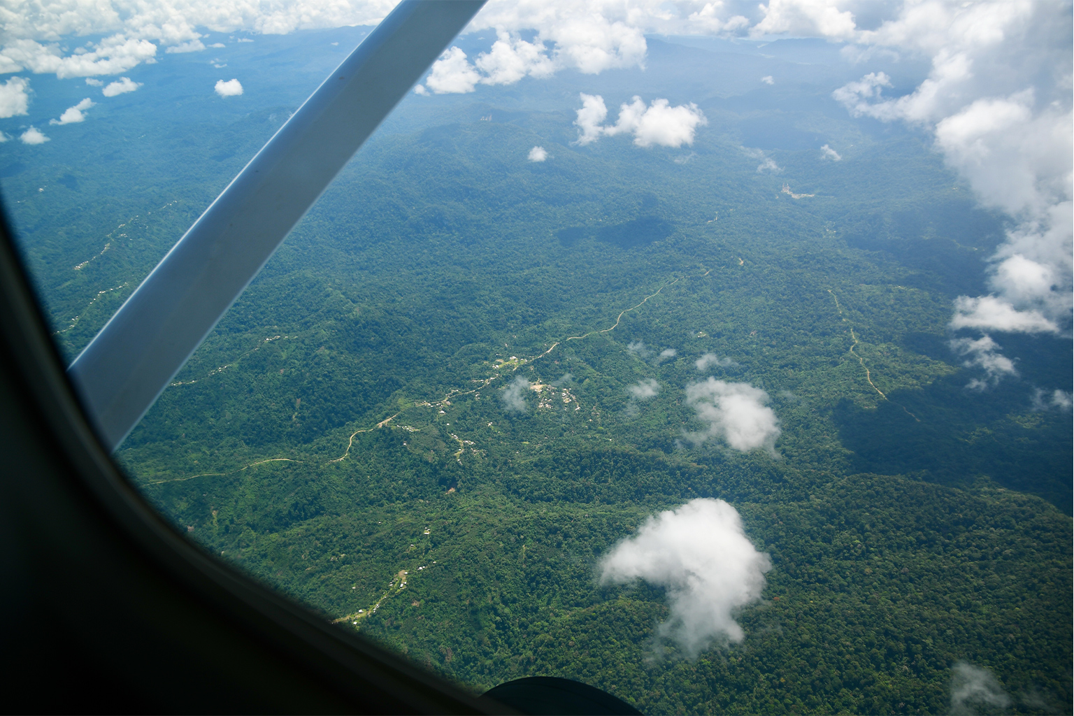 Roads and a village seen from the air in the Torricelli Mountains.
