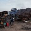 Huge logs are delivered daily to the Koh Kong provincial prison in Cambodia