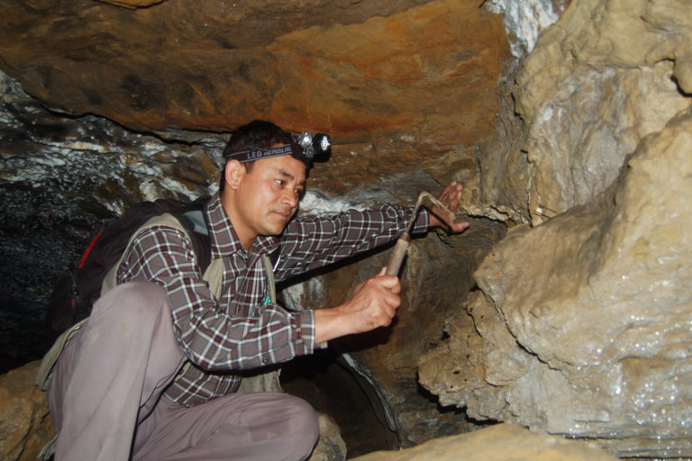 Budha looking for snails in a cave.