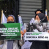 Protest action in front of the PT BGA office demanding the release of the criminalized farmers.