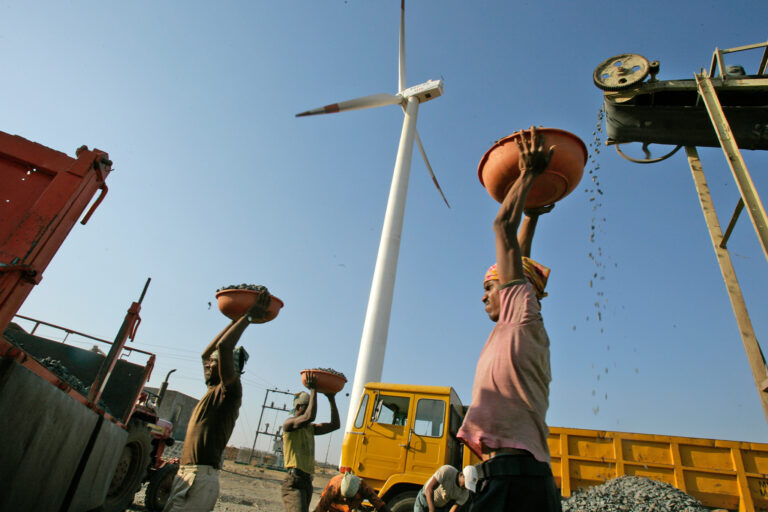Laborers at Land Rover's wind energy project purposed for carbon finance in India.